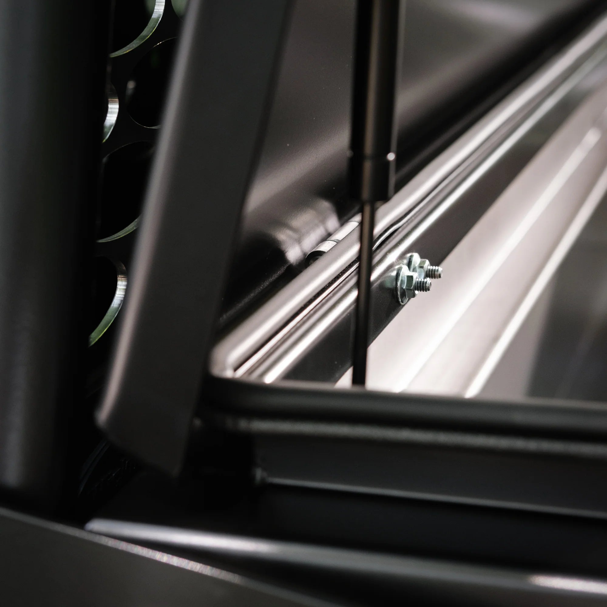 Close up of an open Maverick Crossbox showing the low profile hinge