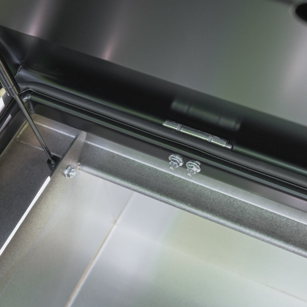 Crossbox close up, showing low profile hinge used to create a sleek, compact lid