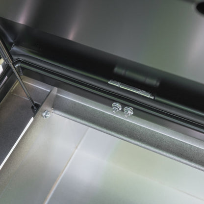 Crossbox close up, showing low profile hinge used to create a sleek, compact lid