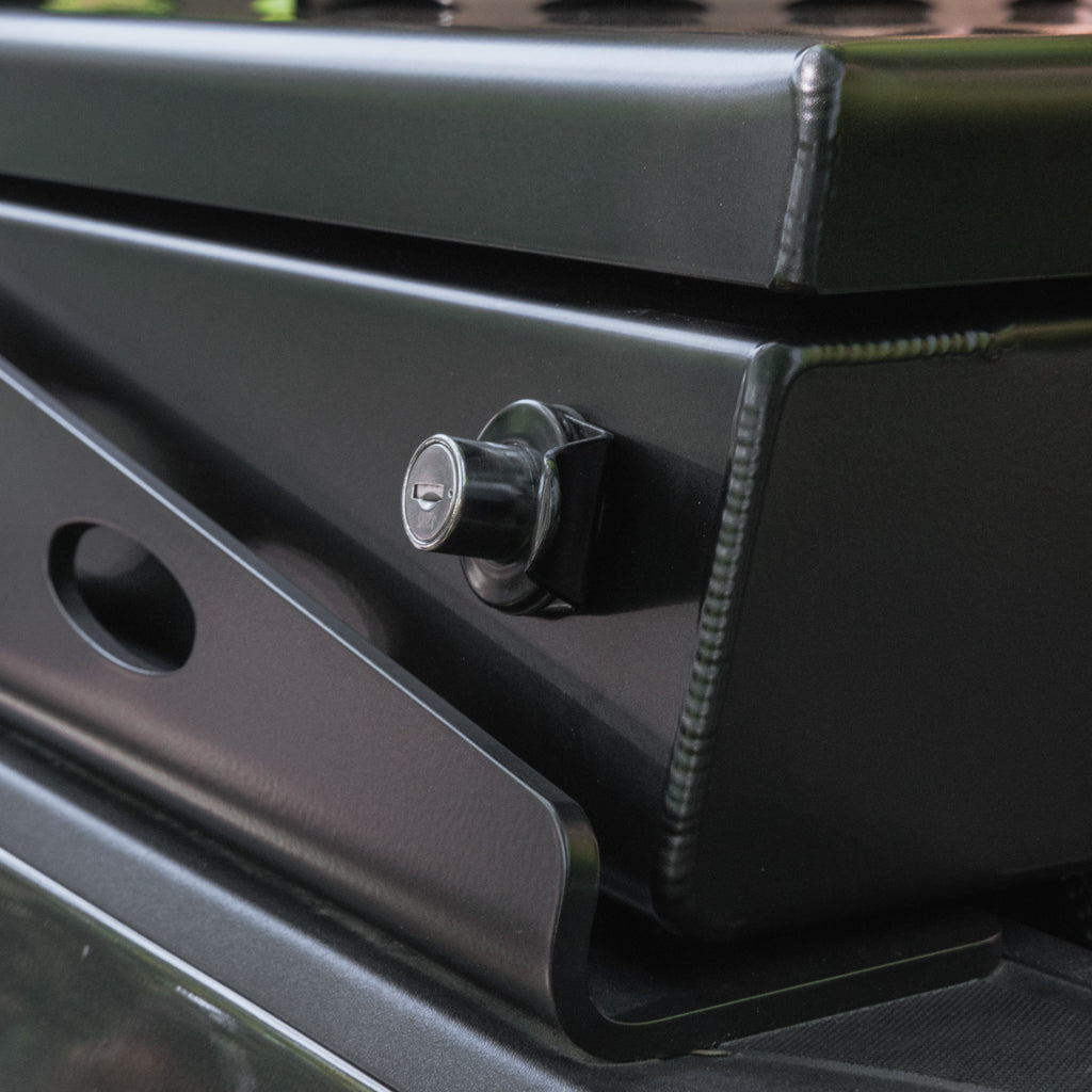 Black crossbox close up, showing the corner weld and lid lock