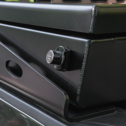 Black crossbox close up, showing the corner weld and lid lock